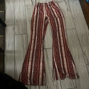 COLORED “FORBIDDEN” SILK FLARED PANTS